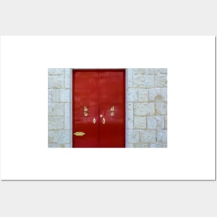 Red wooden door with golden vintage knockers Posters and Art